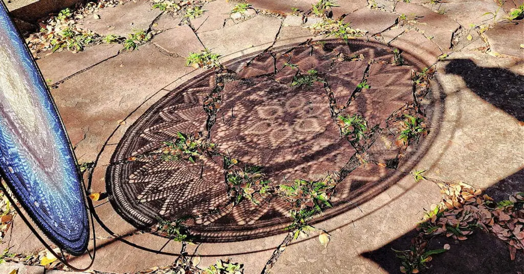 Extended Unseen Mandala Casting Shadow on the Ground